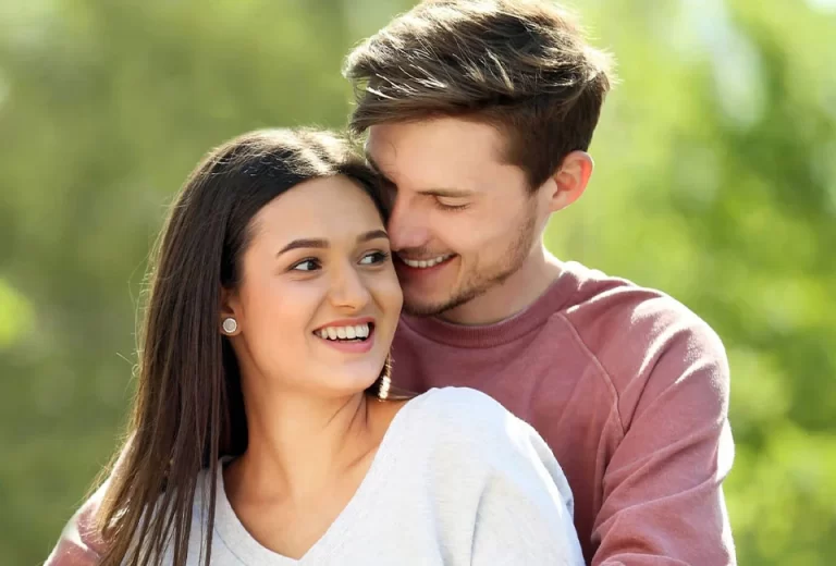 Happy couple with healthy smile