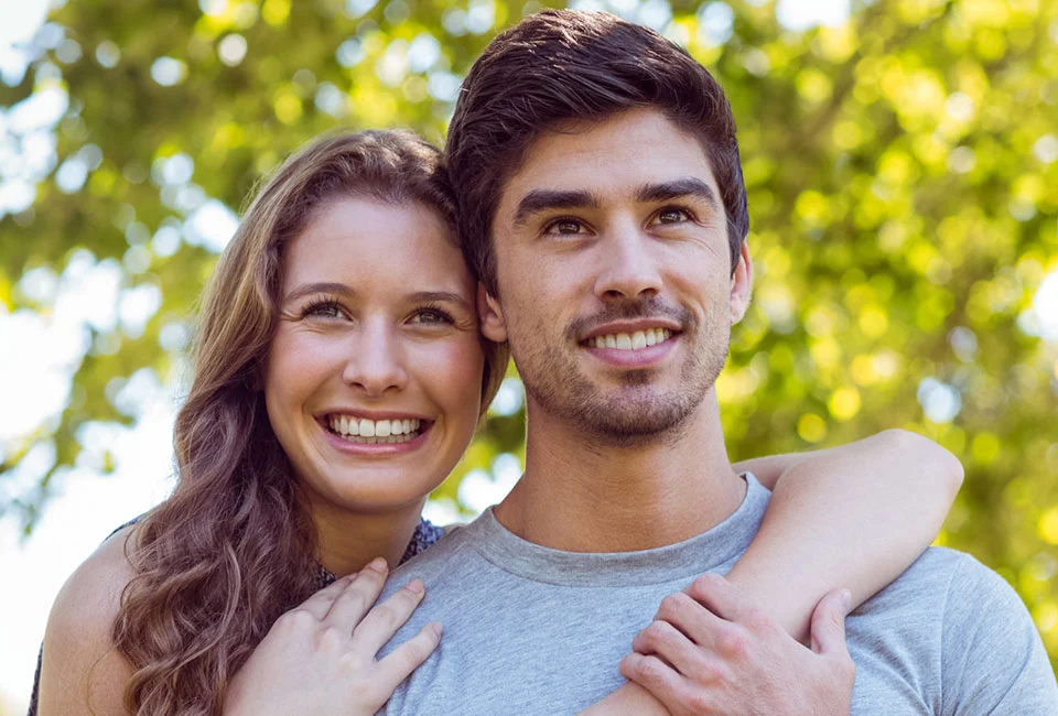 Young couple with great Hollywood smile