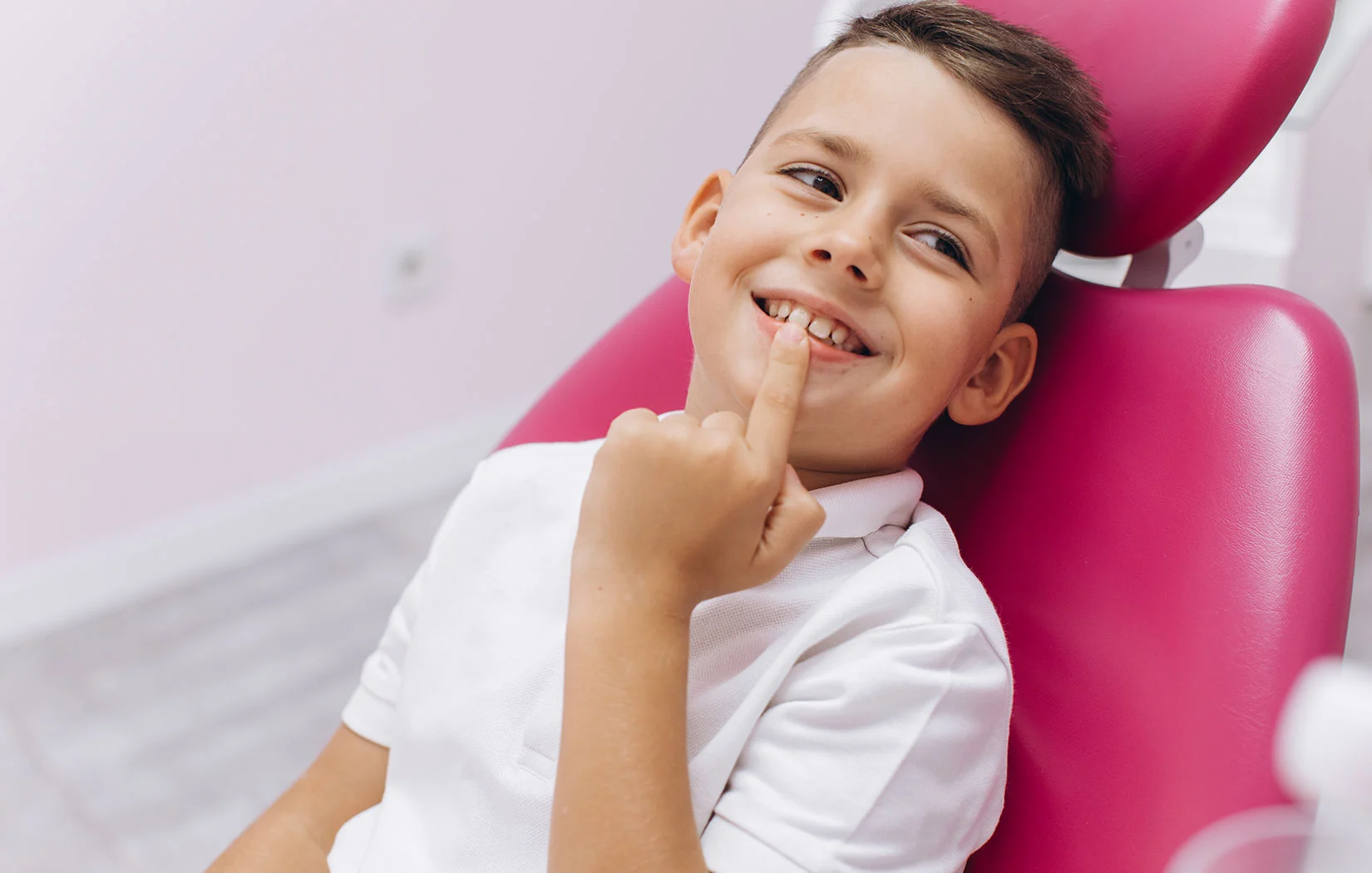 Happy kid on dentistry chair in Woodland Hills, CA