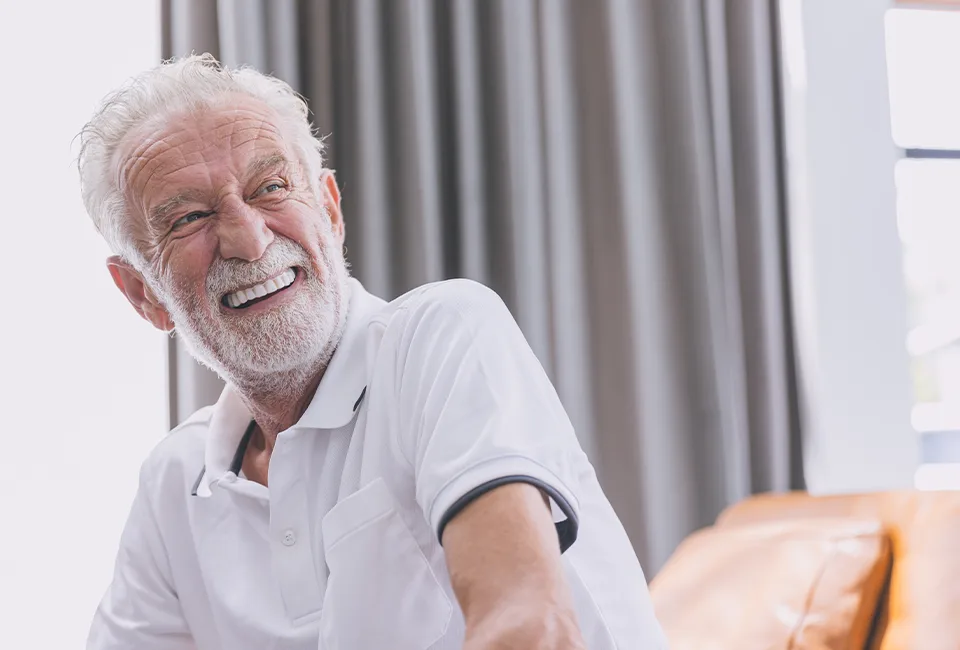 Patient smiling with new set of teeth in Woodland Hills, CA